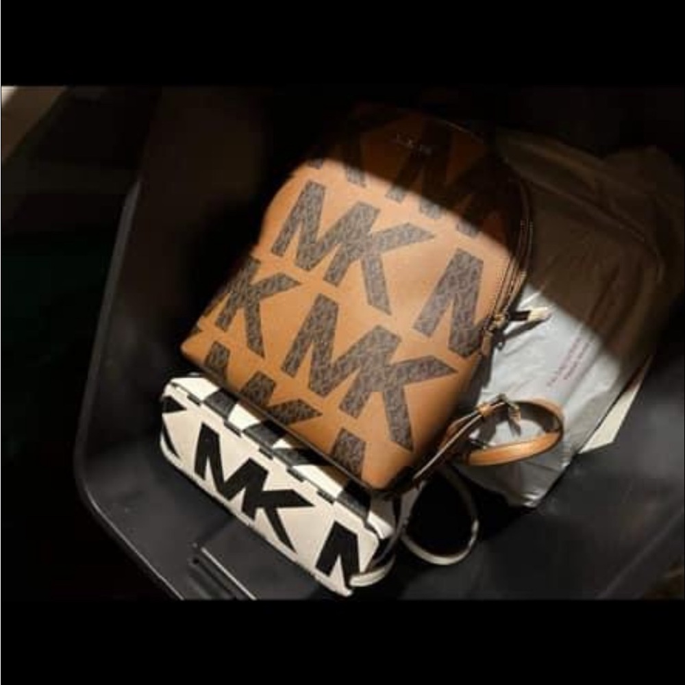 Dark brown and light brown Michael Kors medium backpack brand new with tags